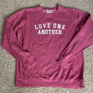 Red Crewneck Sweatshirt - Love One Another worn as an oversized fit
